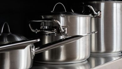 stainless steel cooking pots on stainless steel tray